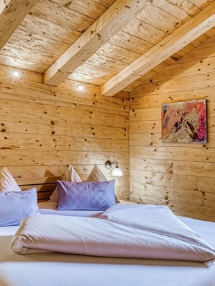 Schlafzimmer im Privat Spa Chalet Plus im Naturresort Puradies Schlafzimmer im Privat Spa Chalet Plus im Naturresort Puradies