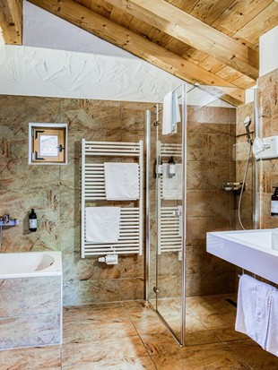 Bathroom at the Private Spa Chalet Deluxe at Naturresort Puradies Bathroom at the Private Spa Chalet Deluxe at Naturresort Puradies
