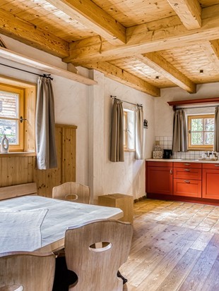 Dining Area with Kitchen at the Private Spa Chalet Deluxe at Naturresort Puradies Dining area with kitchen at the Private Spa Chalet Deluxe at Naturresort Puradies