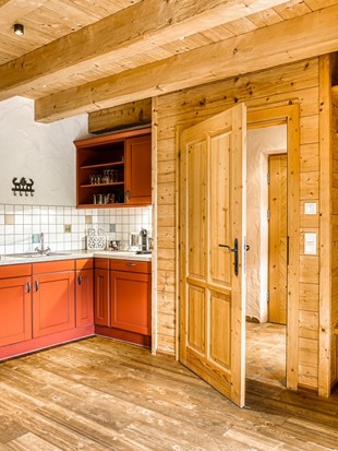 Kitchen with Wardrobe Area at the Private Spa Chalet Honeymoon at Naturresort Puradies Kitchen with wardrobe area at the Private Spa Chalet Honeymoon at Naturresort Puradies