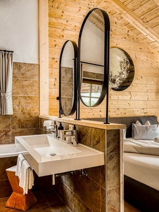 Bedroom with Open Bathroom at the Private Spa Chalet Puradies x Moroso at Naturresort Puradies Bedroom with open bathroom at the Private Spa Chalet Puradies x Moroso at Naturresort Puradies