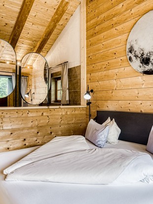 Bedroom with Open Bathroom at the Private Spa Chalet Puradies x Moroso at Naturresort Puradies Bedroom with open bathroom at the Private Spa Chalet Puradies x Moroso at Naturresort Puradies