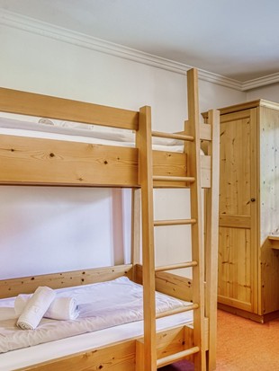 Kinderzimmer mit Etagenbett im Genießer Familienzimmer im Naturresort Puradies