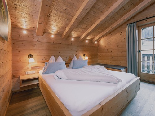 Schlafzimmer im Chalet im Puradies im Winter, Naturresort Puradies, Leogang Schlafzimmer im Chalet im Naturresort Puradies im Winter