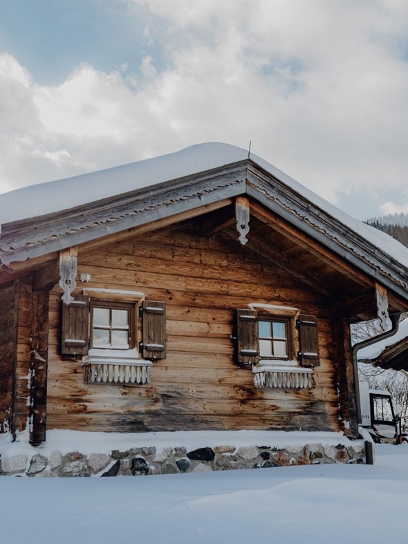 Snow-Covered Chalet in Winter, Naturresort Puradies, Leogang, Salzburger Land Snow-covered chalet in winter, Puradies Leogang